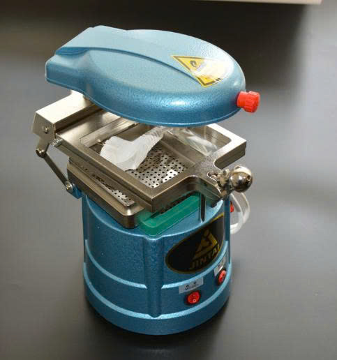 Máy ép máng tẩy